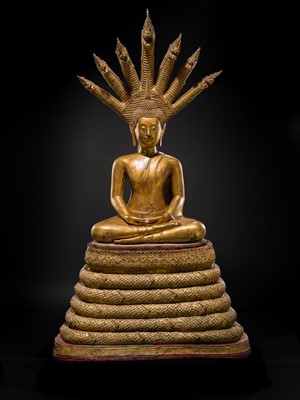 Lot 33 - A MONUMENTAL (194 CM HIGH) GILT-LACQUERED BRONZE FIGURE OF BUDDHA MUCHALINDA, RATTANAKOSIN PERIOD