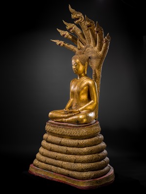 Lot 33 - A MONUMENTAL (194 CM HIGH) GILT-LACQUERED BRONZE FIGURE OF BUDDHA MUCHALINDA, RATTANAKOSIN PERIOD