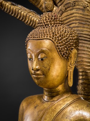 Lot 33 - A MONUMENTAL (194 CM HIGH) GILT-LACQUERED BRONZE FIGURE OF BUDDHA MUCHALINDA, RATTANAKOSIN PERIOD