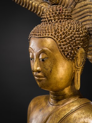 Lot 33 - A MONUMENTAL (194 CM HIGH) GILT-LACQUERED BRONZE FIGURE OF BUDDHA MUCHALINDA, RATTANAKOSIN PERIOD
