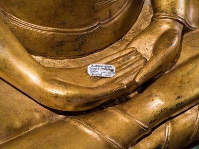 Lot 33 - A MONUMENTAL (194 CM HIGH) GILT-LACQUERED BRONZE FIGURE OF BUDDHA MUCHALINDA, RATTANAKOSIN PERIOD