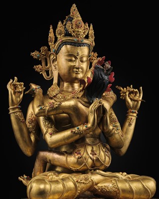 Lot 93 - A MAGNIFICENT AND VERY LARGE GILT-BRONZE FIGURE OF SHADAKSHARI LOKESHVARA WITH CONSORT, TIBET, FIRST HALF OF THE 20TH CENTURY