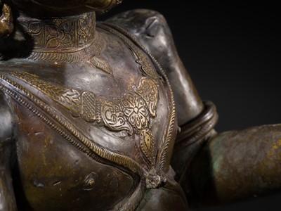 Lot 71 - A FINE AND VERY LARGE (113 CM HIGH) SILVER AND COPPER-INLAID BRONZE FIGURE OF GARUDA, SOUTH INDIA, 17TH-18TH CENTURY
