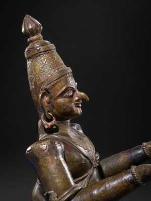 Lot 71 - A FINE AND VERY LARGE (113 CM HIGH) SILVER AND COPPER-INLAID BRONZE FIGURE OF GARUDA, SOUTH INDIA, 17TH-18TH CENTURY