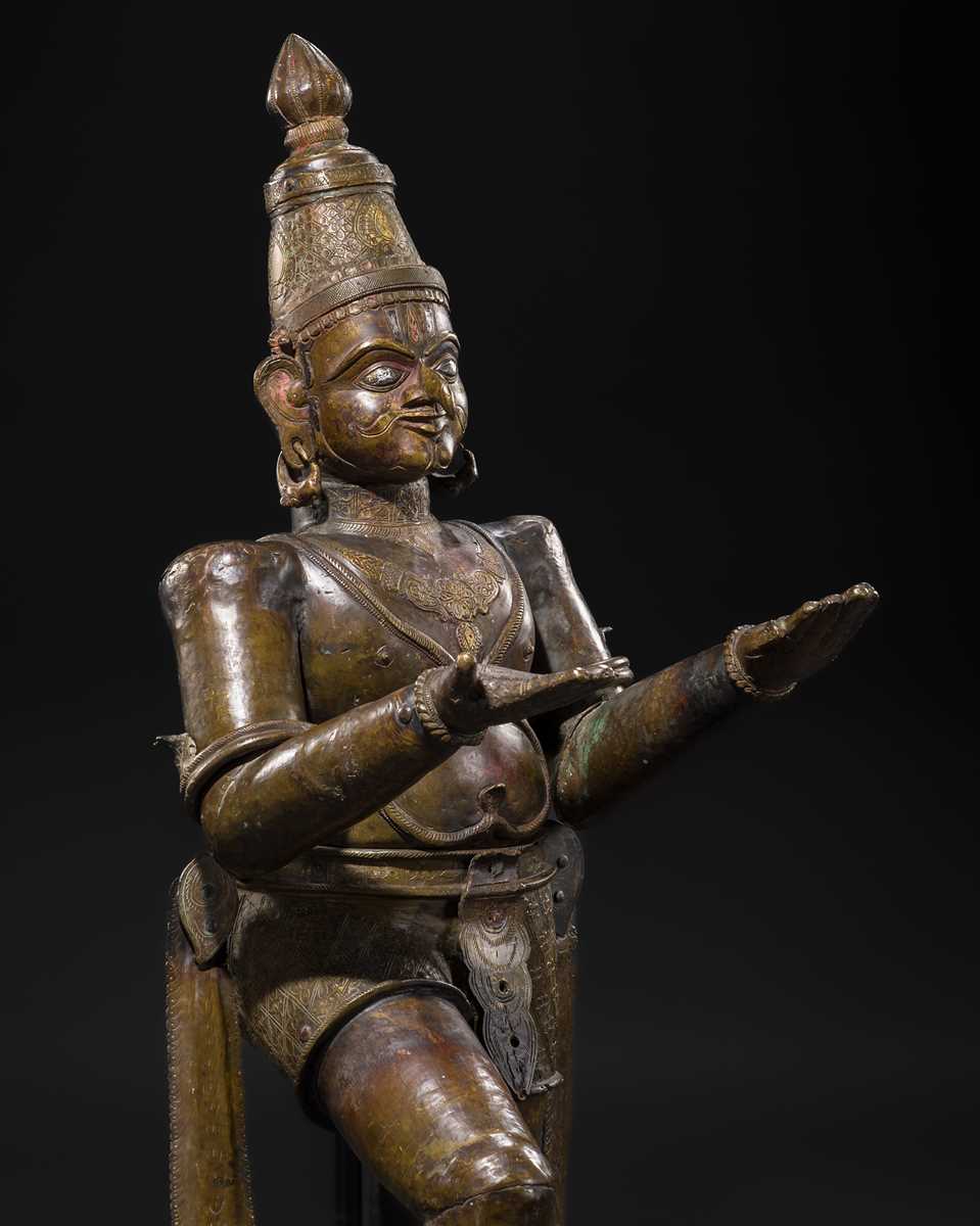 Lot 71 - A FINE AND VERY LARGE (113 CM HIGH) SILVER AND COPPER-INLAID BRONZE FIGURE OF GARUDA, SOUTH INDIA, 17TH-18TH CENTURY