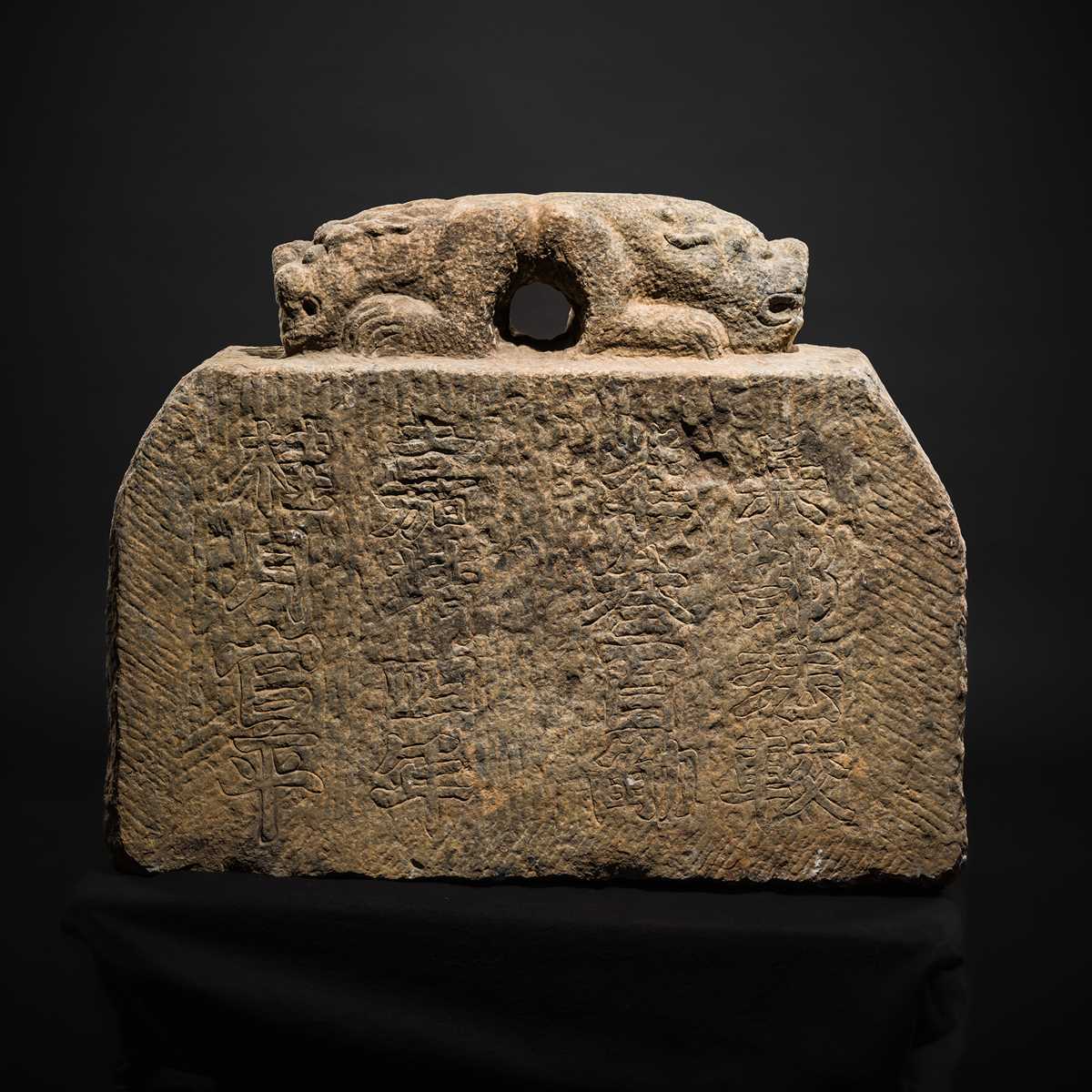 Lot 124 - A LARGE STONE WEIGHT FOR THE MINISTRY OF NATIONAL DEFENSE, GUANFA, 300 JIN, DATED 1525
