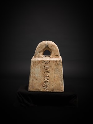 Lot 125 - AN INSCRIBED IMPERIAL MARBLE WEIGHT FOR THE WENSIYUAN, GUANFA, 160 JIN (102 KG), DATED 1216