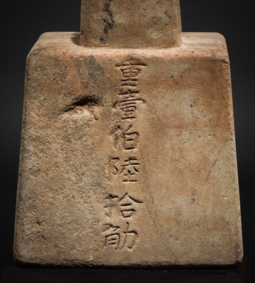 Lot 125 - AN INSCRIBED IMPERIAL MARBLE WEIGHT FOR THE WENSIYUAN, GUANFA, 160 JIN (102 KG), DATED 1216