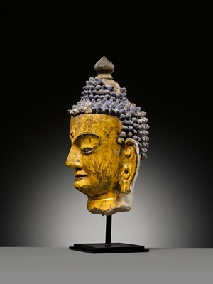 Lot 72 - A LARGE AND IMPRESSIVE POLYCHROME CLAY AND STUCCO HEAD OF BUDDHA, 15TH-16TH CENTURY