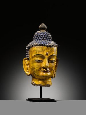 Lot 72 - A LARGE AND IMPRESSIVE POLYCHROME CLAY AND STUCCO HEAD OF BUDDHA, 15TH-16TH CENTURY