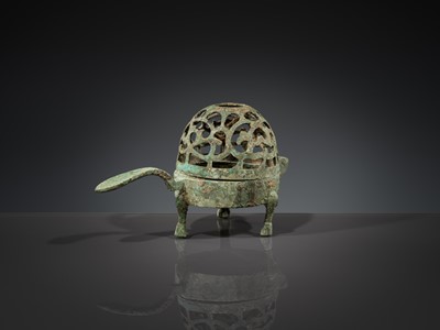 A SMALL BRONZE TRIPOD LAMP WITH A HINGED RETICULATED COVER, HAN DYNASTY