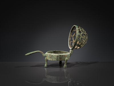A SMALL BRONZE TRIPOD LAMP WITH A HINGED RETICULATED COVER, HAN DYNASTY
