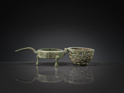 A SMALL BRONZE TRIPOD LAMP WITH A HINGED RETICULATED COVER, HAN DYNASTY