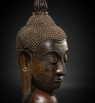 Lot 37 - A MONUMENTAL (106 CM HIGH) BRONZE HEAD OF BUDDHA, AYUTTHAYA STYLE