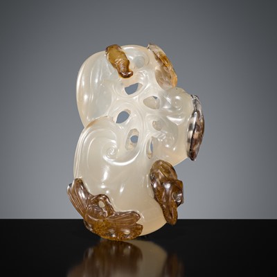 Lot 425 - A RETICULATED ‘LINGZHI, BAT AND DRAGONFLIES’ AGATE PENDANT, SUZHOU SCHOOL, MID-QING DYNASTY