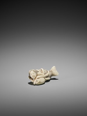 Lot 176 - TOMOCHIKA: A RARE IVORY NETSUKE OF A MERMAID ENAMORED WITH AN OCTOPUS