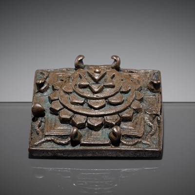 Lot 213 - A BRONZE SRI YANTRA IN THE SHAPE OF MOUNT MERU, 17TH-18TH CENTURY