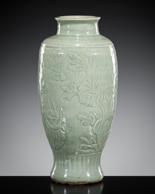 Lot 257 - A FINELY CARVED LONGQUAN CELADON ‘LOTUS’ VASE, MING DYNASTY