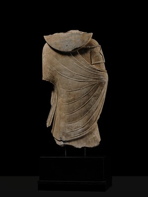 Lot 100 - A MONUMENTAL AND MASSIVE (820 KG) STONE TORSO OF A BODHISATTVA, KUSHAN PERIOD, ANCIENT REGION OF GANDHARA, CIRCA 3RD-4TH CENTURY