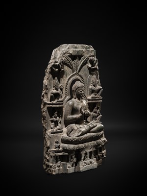 Lot 68 - A RARE AND IMPORTANT BLACK STONE STELE OF BUDDHA PREACHING THE FIRST SERMON AT SARNATH, PROBABLY RATNAGIRI, 9TH-12TH CENTURY
