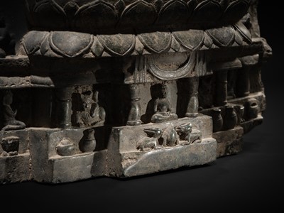 Lot 68 - A RARE AND IMPORTANT BLACK STONE STELE OF BUDDHA PREACHING THE FIRST SERMON AT SARNATH, PROBABLY RATNAGIRI, 9TH-12TH CENTURY