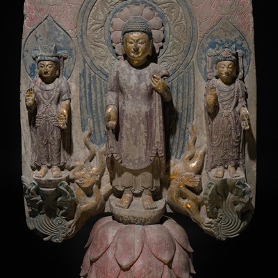 Lot 128 - A LARGE AND MASSIVE GILT AND POLYCHROME LIMESTONE STELE OF BUDDHA SHAKYAMUNI AND PRABHUTARATNA, EASTERN WEI PERIOD