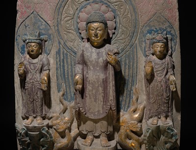 Lot 128 - A LARGE AND MASSIVE GILT AND POLYCHROME LIMESTONE STELE OF BUDDHA SHAKYAMUNI AND PRABHUTARATNA, EASTERN WEI PERIOD