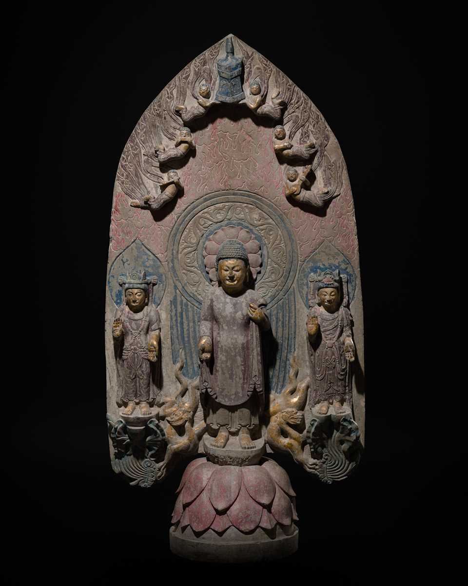 Lot 128 - A LARGE AND MASSIVE GILT AND POLYCHROME LIMESTONE STELE OF BUDDHA SHAKYAMUNI AND PRABHUTARATNA, EASTERN WEI PERIOD