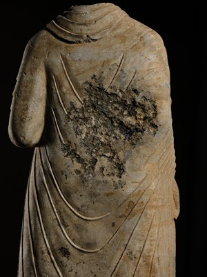 Lot 58 - A RARE AND MONUMENTAL (175 CM HIGH) GRAY SCHIST TORSO OF BUDDHA SHAKYAMUNI, KUSHAN PERIOD, ANCIENT REGION OF GANDHARA, CIRCA 2ND-3RD CENTURY