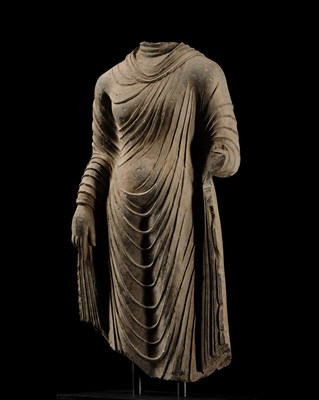Lot 58 - A RARE AND MONUMENTAL (175 CM HIGH) GRAY SCHIST TORSO OF BUDDHA SHAKYAMUNI, KUSHAN PERIOD, ANCIENT REGION OF GANDHARA, CIRCA 2ND-3RD CENTURY