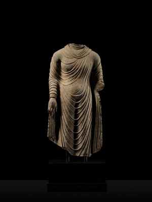 Lot 58 - A RARE AND MONUMENTAL (175 CM HIGH) GRAY SCHIST TORSO OF BUDDHA SHAKYAMUNI, KUSHAN PERIOD, ANCIENT REGION OF GANDHARA, CIRCA 2ND-3RD CENTURY