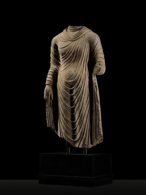 Lot 58 - A RARE AND MONUMENTAL (175 CM HIGH) GRAY SCHIST TORSO OF BUDDHA SHAKYAMUNI, KUSHAN PERIOD, ANCIENT REGION OF GANDHARA, CIRCA 2ND-3RD CENTURY