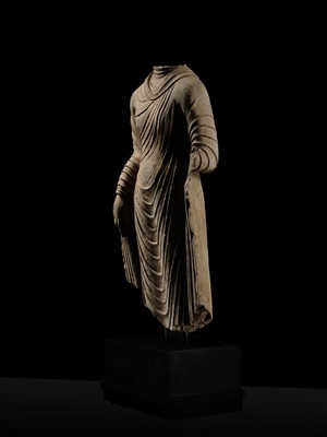 Lot 58 - A RARE AND MONUMENTAL (175 CM HIGH) GRAY SCHIST TORSO OF BUDDHA SHAKYAMUNI, KUSHAN PERIOD, ANCIENT REGION OF GANDHARA, CIRCA 2ND-3RD CENTURY