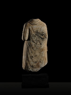 Lot 58 - A RARE AND MONUMENTAL (175 CM HIGH) GRAY SCHIST TORSO OF BUDDHA SHAKYAMUNI, KUSHAN PERIOD, ANCIENT REGION OF GANDHARA, CIRCA 2ND-3RD CENTURY