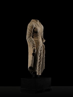 Lot 58 - A RARE AND MONUMENTAL (175 CM HIGH) GRAY SCHIST TORSO OF BUDDHA SHAKYAMUNI, KUSHAN PERIOD, ANCIENT REGION OF GANDHARA, CIRCA 2ND-3RD CENTURY
