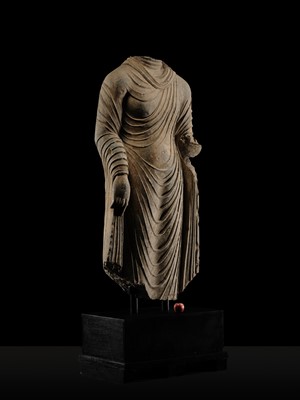 Lot 58 - A RARE AND MONUMENTAL (175 CM HIGH) GRAY SCHIST TORSO OF BUDDHA SHAKYAMUNI, KUSHAN PERIOD, ANCIENT REGION OF GANDHARA, CIRCA 2ND-3RD CENTURY