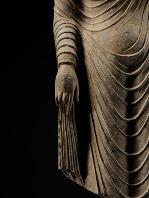 Lot 58 - A RARE AND MONUMENTAL (175 CM HIGH) GRAY SCHIST TORSO OF BUDDHA SHAKYAMUNI, KUSHAN PERIOD, ANCIENT REGION OF GANDHARA, CIRCA 2ND-3RD CENTURY