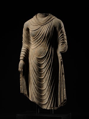 Lot 58 - A RARE AND MONUMENTAL (175 CM HIGH) GRAY SCHIST TORSO OF BUDDHA SHAKYAMUNI, KUSHAN PERIOD, ANCIENT REGION OF GANDHARA, CIRCA 2ND-3RD CENTURY