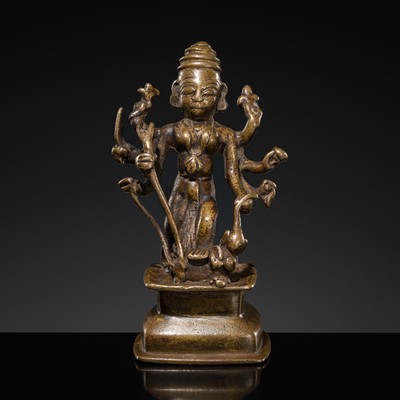 Lot 79 - A SMALL BRONZE FIGURE OF DURGA SLAYING THE BUFFALO-DEMON MAHISHA, DECCAN, 17TH-18TH CENTURY