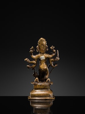 Lot 79 - A SMALL BRONZE FIGURE OF DURGA SLAYING THE BUFFALO-DEMON MAHISHA, DECCAN, 17TH-18TH CENTURY