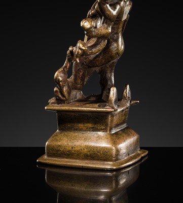 Lot 79 - A SMALL BRONZE FIGURE OF DURGA SLAYING THE BUFFALO-DEMON MAHISHA, DECCAN, 17TH-18TH CENTURY