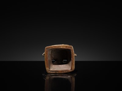 Lot 79 - A SMALL BRONZE FIGURE OF DURGA SLAYING THE BUFFALO-DEMON MAHISHA, DECCAN, 17TH-18TH CENTURY