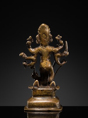 Lot 79 - A SMALL BRONZE FIGURE OF DURGA SLAYING THE BUFFALO-DEMON MAHISHA, DECCAN, 17TH-18TH CENTURY