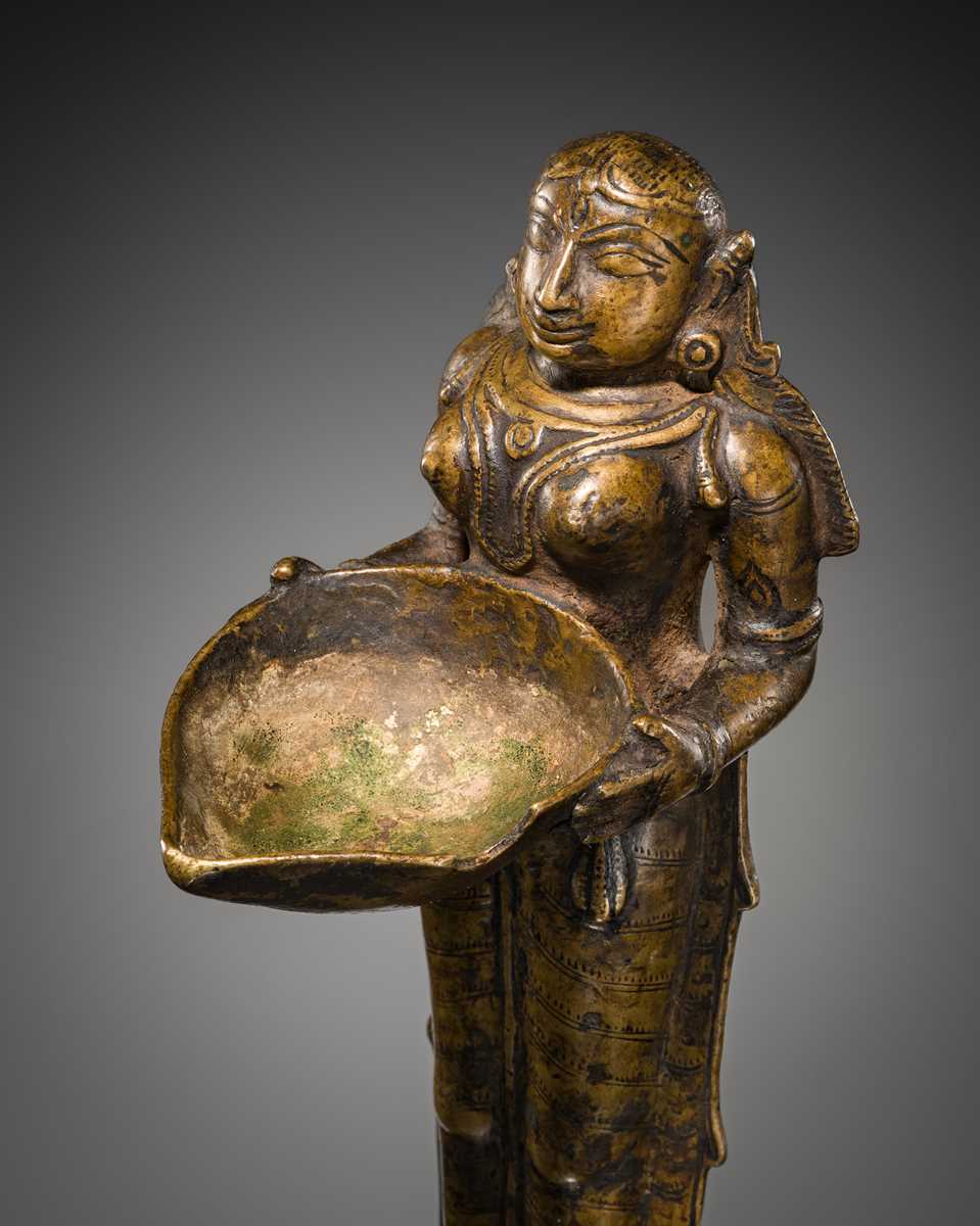 Lot 81 - A COPPER ALLOY ‘DEEPALAKSHMI’ VOTIVE LAMP, SOUTH INDIA, 17TH-18TH CENTURY