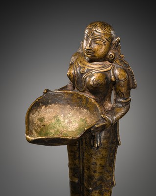Lot 81 - A COPPER ALLOY ‘DEEPALAKSHMI’ VOTIVE LAMP, SOUTH INDIA, 17TH-18TH CENTURY