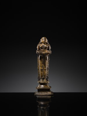 Lot 81 - A COPPER ALLOY ‘DEEPALAKSHMI’ VOTIVE LAMP, SOUTH INDIA, 17TH-18TH CENTURY