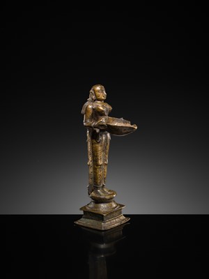 Lot 81 - A COPPER ALLOY ‘DEEPALAKSHMI’ VOTIVE LAMP, SOUTH INDIA, 17TH-18TH CENTURY