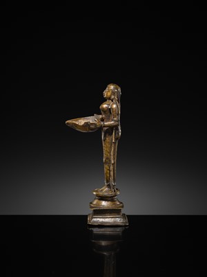 Lot 81 - A COPPER ALLOY ‘DEEPALAKSHMI’ VOTIVE LAMP, SOUTH INDIA, 17TH-18TH CENTURY