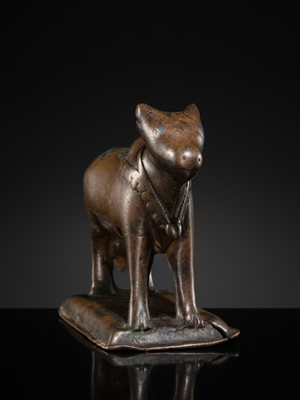 Lot 72 - A SILVER-INLAID BRONZE FIGURE OF NANDI, HIMACHAL PRADESH, 10TH CENTURY