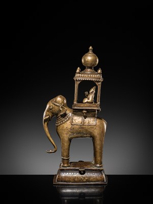 Lot 76 - A BRONZE MODEL OF AN ELEPHANT WITH CANOPY CONTAINING A BRASS FIGURE OF MALE DEITY, DECCAN, 17TH CENTURY
